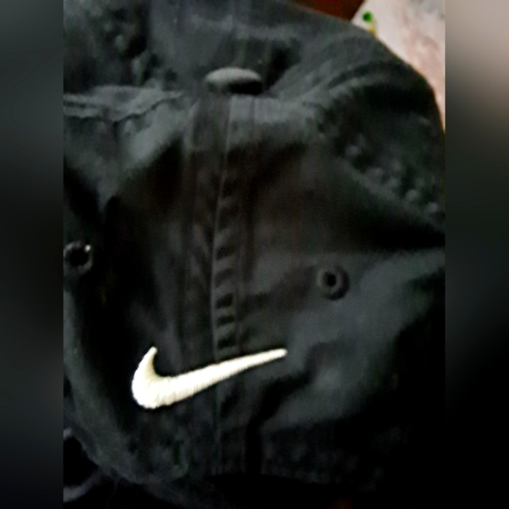 Nike Black Cap with White Swoosh.  Kids